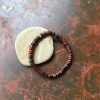 Armband elastiskt svarta och bruna träpärlor